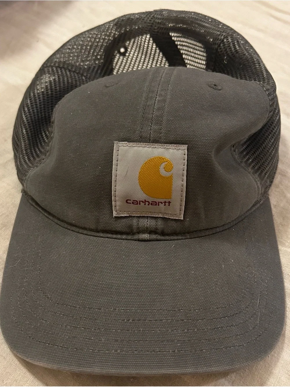 Carhartt Gray Mesh Trucker Cap with Yellow Logo Patch